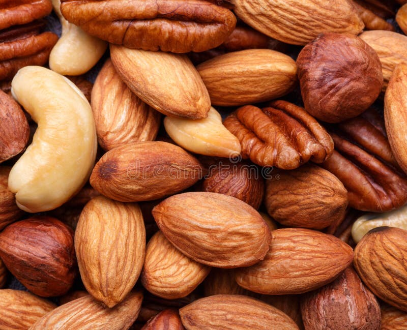 Background texture of assorted mixed nuts stock photo