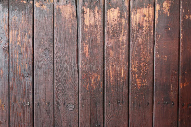 Background and texture of the brown wooden wall. royalty free stock photos