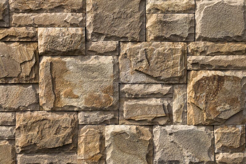 Background, Texture, Masonry of Yellow Natural Stone Blocks Stock Image