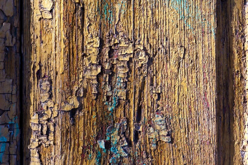 Wooden colorful texture background an old painted wood surface with flaky yellow, purple, blue and brown paint stock photos Wooden colorful texture background an old painted wood surface with flaky yellow, purple, blue and brown paint stock photos
