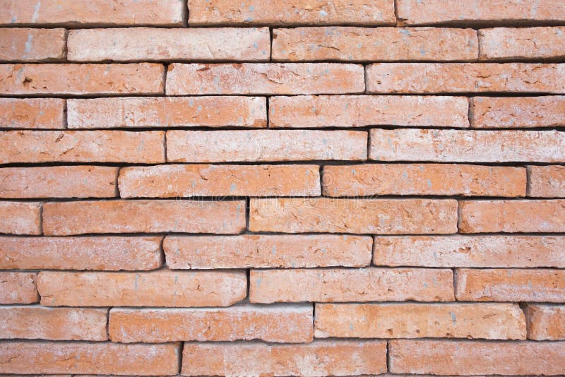 Background and texture of orange brick wall. Vintage style. stock images