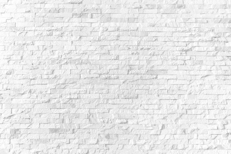 Background and Texture White Brick Stone Cladding Wall Stock Photo