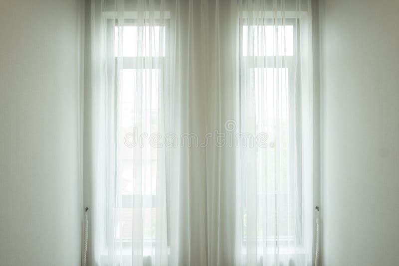 Background and texture of white drape at the window. royalty free stock images