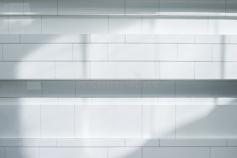 Background and texture of white tile wall in minimal style royalty free stock photography