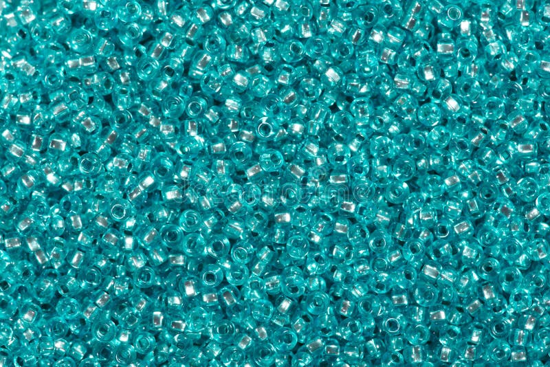 Many turquoise blue color glass beads.