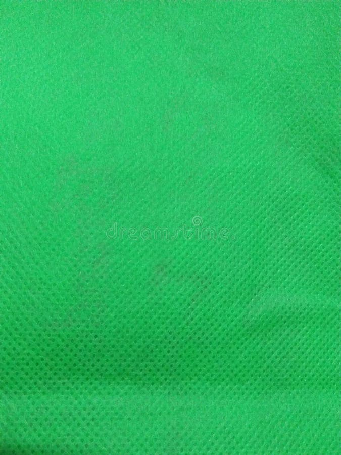 Backgrounds Textured coloured background fiber studio shot pattern textile Textured Effect abstract green background close up royalty free stock photo