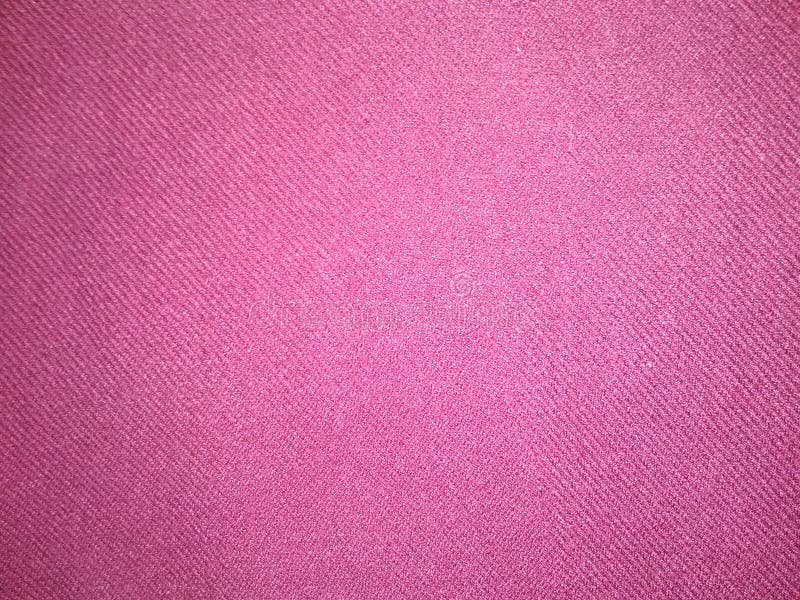 It is a backgrounds wool full frame Textured pink colour textile pattern coloured background material close up in Patna India stock images