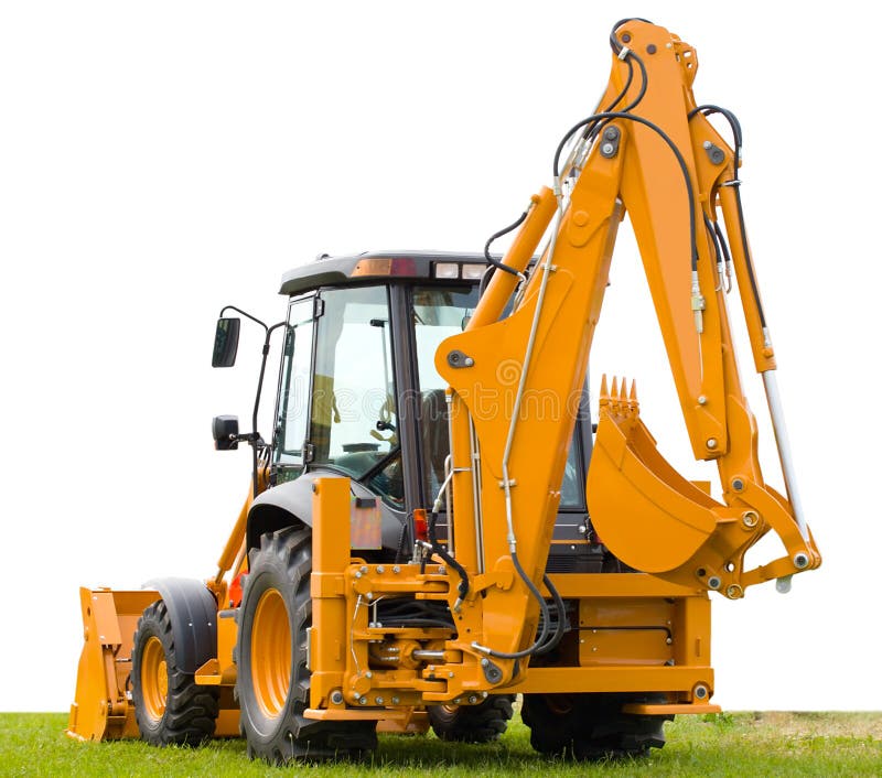 Backhoe on green grass