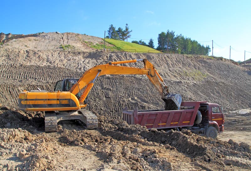 Backhoe loader loading dumper