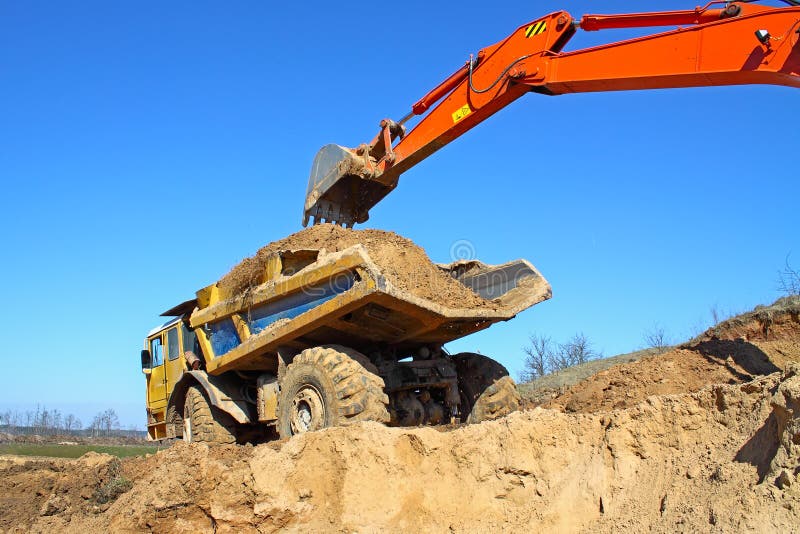 Backhoe loader loading dumper