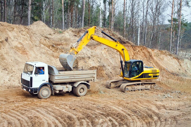 Backhoe loader loading dumper