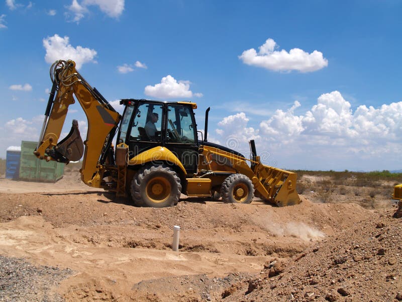 Backhoe Shoveling Dirt stock photo. Image of site, work 6409308