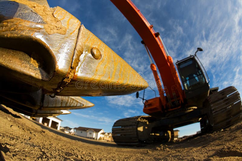 The steel teeth of a backhoe closeup(focus on steel jaw). Claw machine stock images, royalty-free photos and pictures