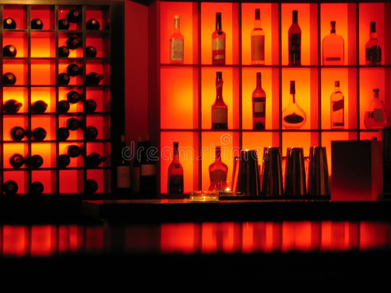 Backlighted bottles club bar background royalty free stock images