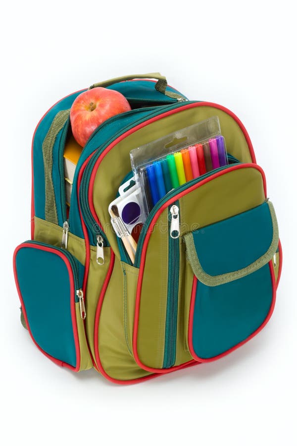 The backpack of the schoolboy filled with a stationary
