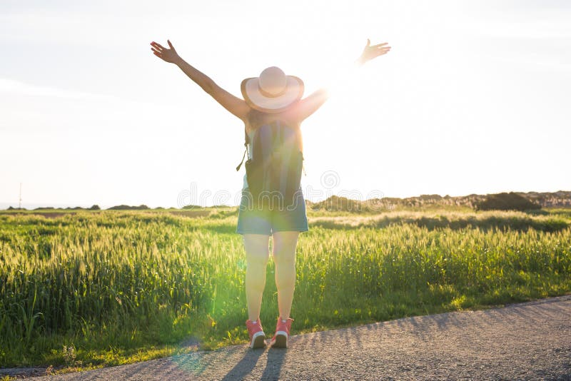 Backpack travel to European countryside, active lifestyle, active summer vacation concept - Woman traveler looking royalty free stock photography Backpack travel to European countryside, active lifestyle, active summer vacation concept - Woman traveler looking royalty free stock photography