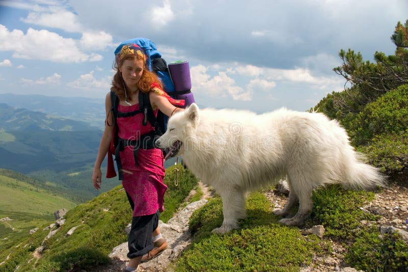 Backpacker girl with dog