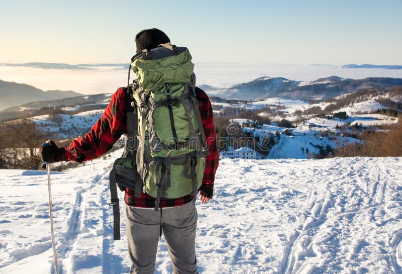 Backpacker Hiking on Snow Covered Mountain Stock Image Image of