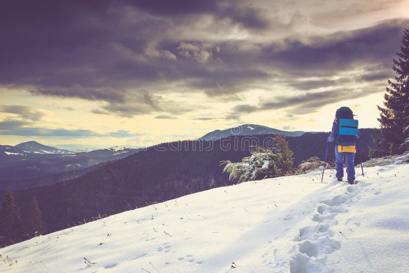 Backpacker Hiking in the Winter Mountains. Stock Image Image of