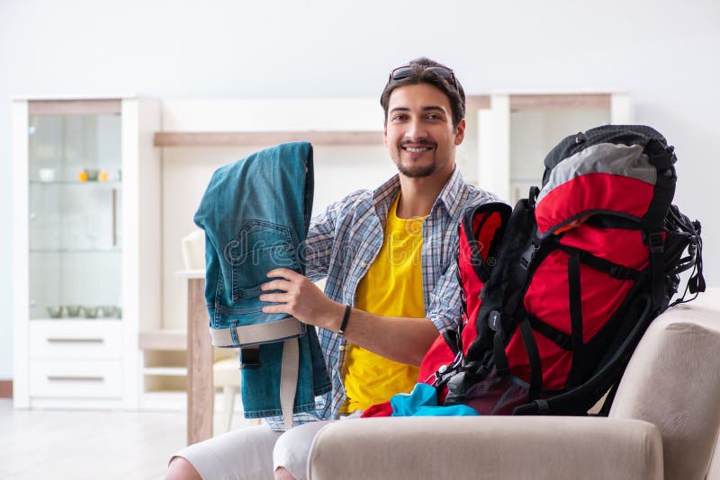 The Backpacker Packing for His Trip Stock Image - Image of back ...