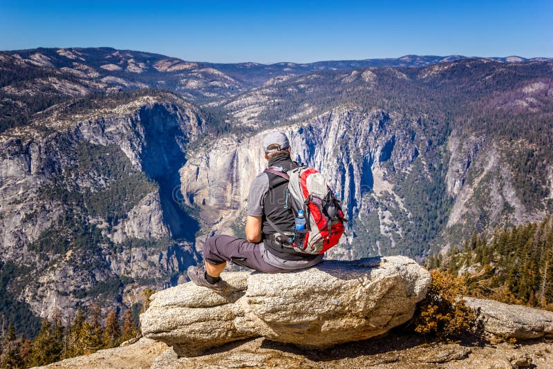 Backpacking in the Yosemite National Park, Woman Enjoying the View ... - Backpacking Yosemite National Park Man Enjoying View Backpacking Yosemite National Park Man Enjoying View 195275970