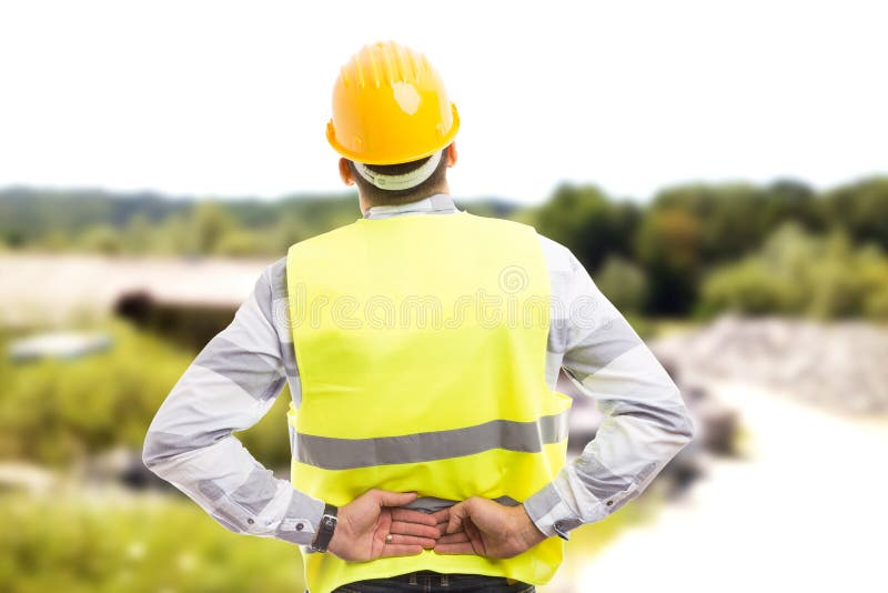 Backpain sufridor herido del trabajador o del ingeniero de construcción foto de archivo libre de regalías Backpain sufridor herido del trabajador o del ingeniero de construcción foto de archivo libre de regalías
