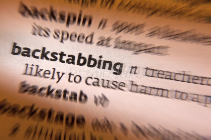 Backstabbing - the action or practice of criticizing someone in a treacherous manner while feigning friendship.