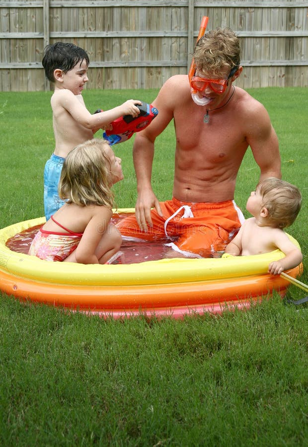 Backyard fun with the family in the kiddie pool