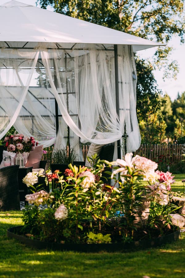 Gazebo for Relax Outdoor. in Garden There is Podium on Which Sofa ...