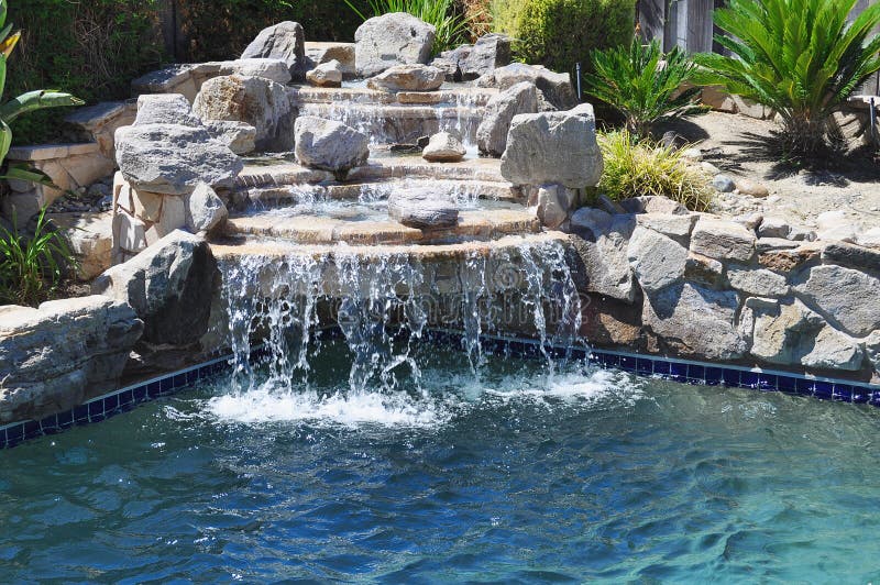 Backyard waterfall royalty free stock photography