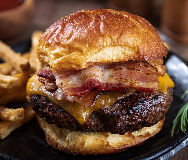 Bacon Cheeseburger on a Toasted Bun Stock Image - Image of burger, food ...