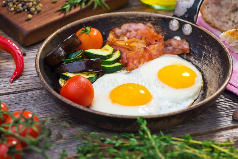 Bacon, eggs and vegetables stock image. Image of kitchen 37750265