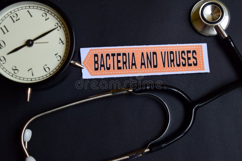 Bacteria and Viruses on the paper with Healthcare Concept Inspiration. alarm clock, Black stethoscope. stock image Bacteria and Viruses on the paper with Healthcare Concept Inspiration. alarm clock, Black stethoscope. stock image