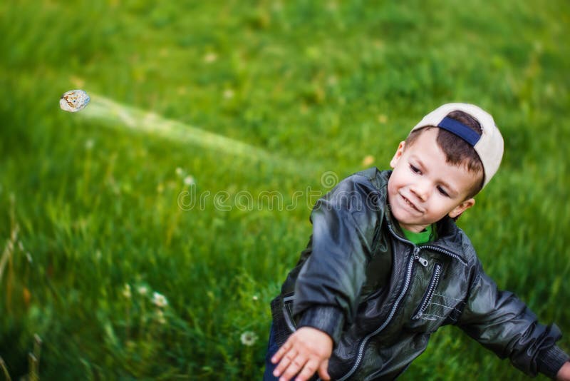 Bad boy throw gravel away royalty free stock photo Bad boy throw gravel away royalty free stock photo