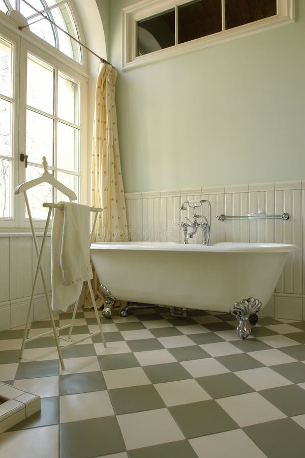 Interior of a beautiful bathroom with big window. Interior of a beautiful bathroom with big window