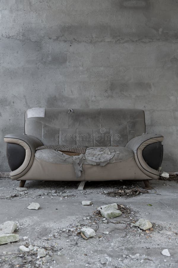 A Badly Damaged Sofa at Vertical Composition Stock Photo Image of