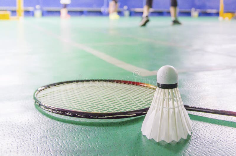 Badminton court with shuttlecock