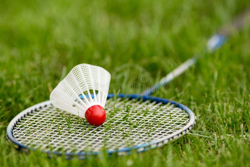 Closeup Of Badminton Racket On Grass In Summer Park Stock Image Image
