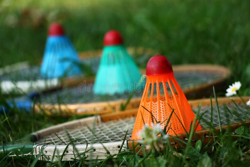Badminton rackets with colorful shuttlecocks stock image Badminton rackets with colorful shuttlecocks stock image