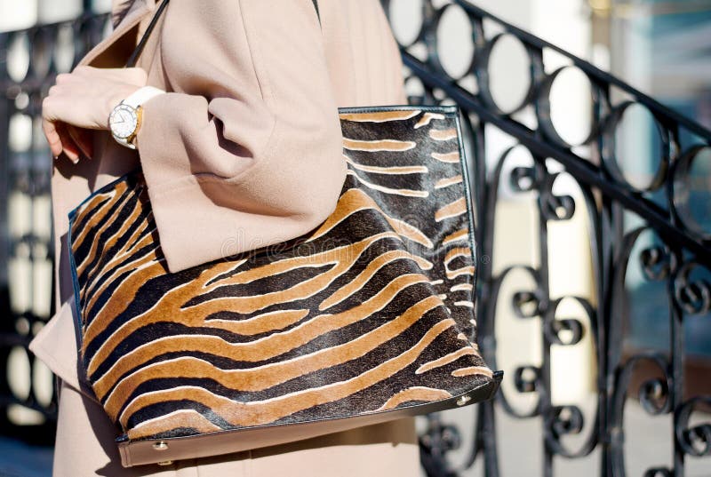 Bag in Leopard Print Close-up. Large Shopping Leather Handbag in Female  Hands. Woman Walking in the City Stock Image - Image of hands, closeup:  143701321