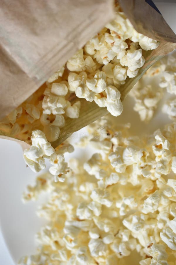 A Bag of Popcorn Open on a Plate in the Kitchen Stock Image Image of