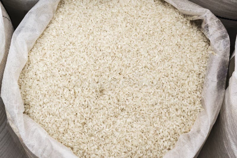 Rice in open bag stock photo. Image of brown, india 117634346
