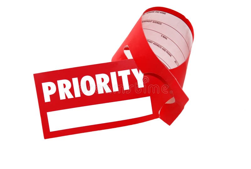 Priority red paper sign for luggage isolated over white. Priority red paper sign for luggage isolated over white