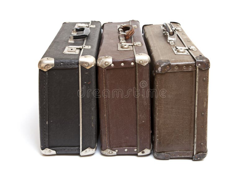 Old travelling luggage isolated on a white background. Old travelling luggage isolated on a white background