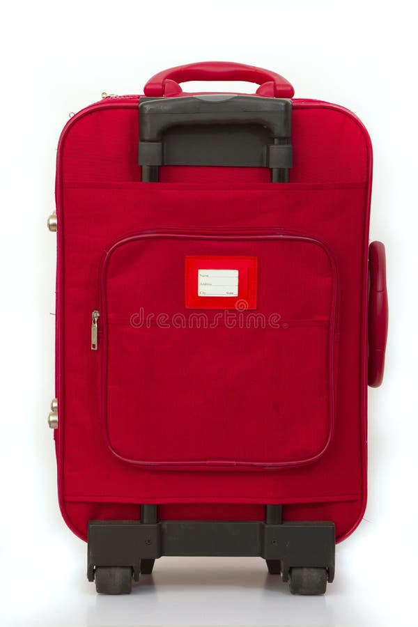 Red luggage isolated on white with tag. Red luggage isolated on white with tag