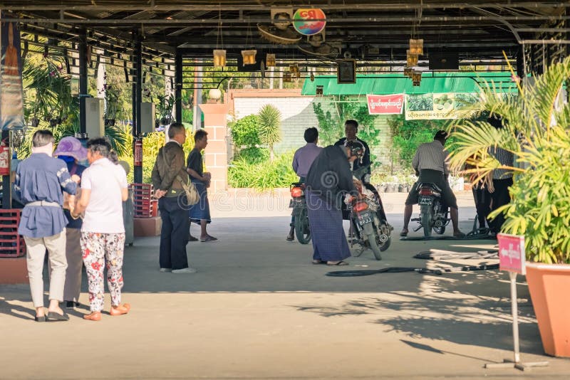 BAGAN-Myanmar, January 20, 2019 : Unidentified Peoples on motorcycles waiting in line for refuel at gas station on january 20,2019 stock photo BAGAN-Myanmar, January 20, 2019 : Unidentified Peoples on motorcycles waiting in line for refuel at gas station on january 20,2019 stock photo