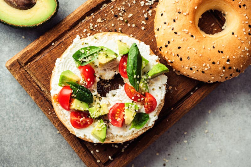 Bagel Toast with Avocado, Cream Cheese and Tomatoes Stock Photo Image