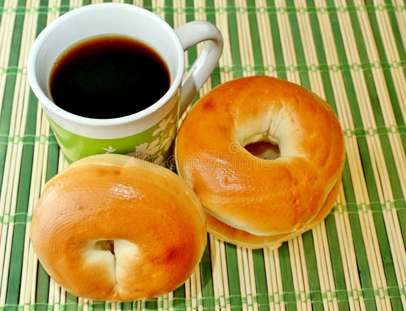 Bagels and cup of coffee stock photo. Image of bagel 15985410