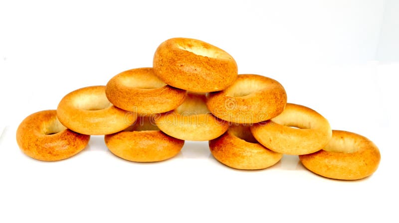 Bagels da cor dourada isolados imagens de stock Bagels da cor dourada isolados imagens de stock
