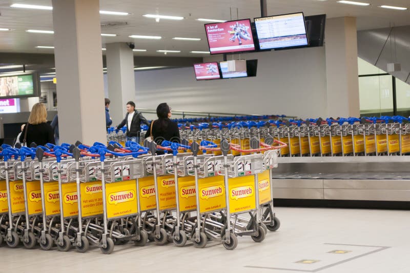 Baggage Carts at Schiphol Airport, Amsterdam, Netherlands. Editorial